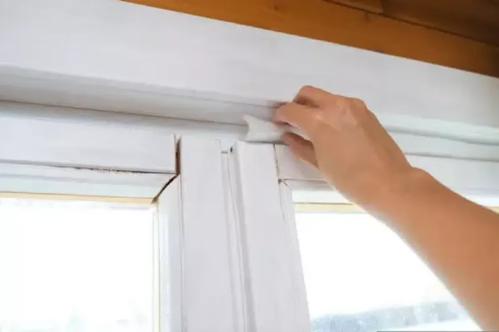 Applying weatherstripping around a window