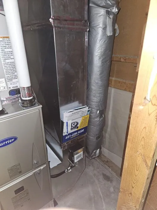 Carrier furnace connected to vertical ductwork