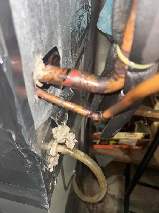 Copper refrigerant line connections during an AC leak repair