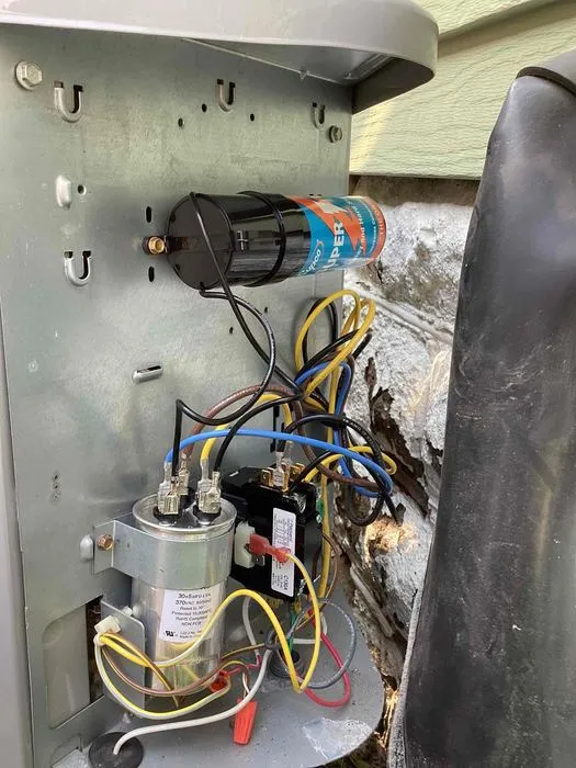 Electrical components inside an outdoor air conditioner