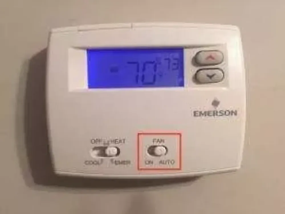 Emerson thermostat with temperature display and fan controls