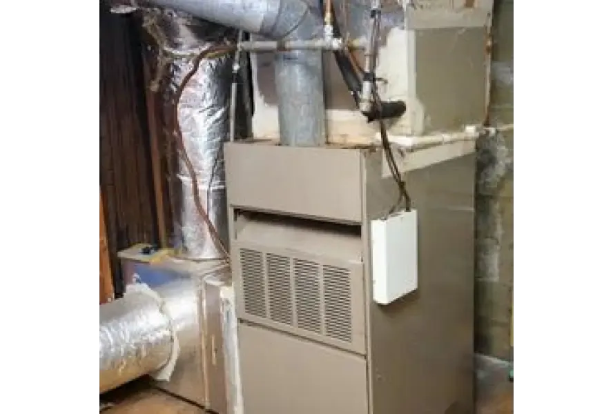 Furnace connected to metal ductwork