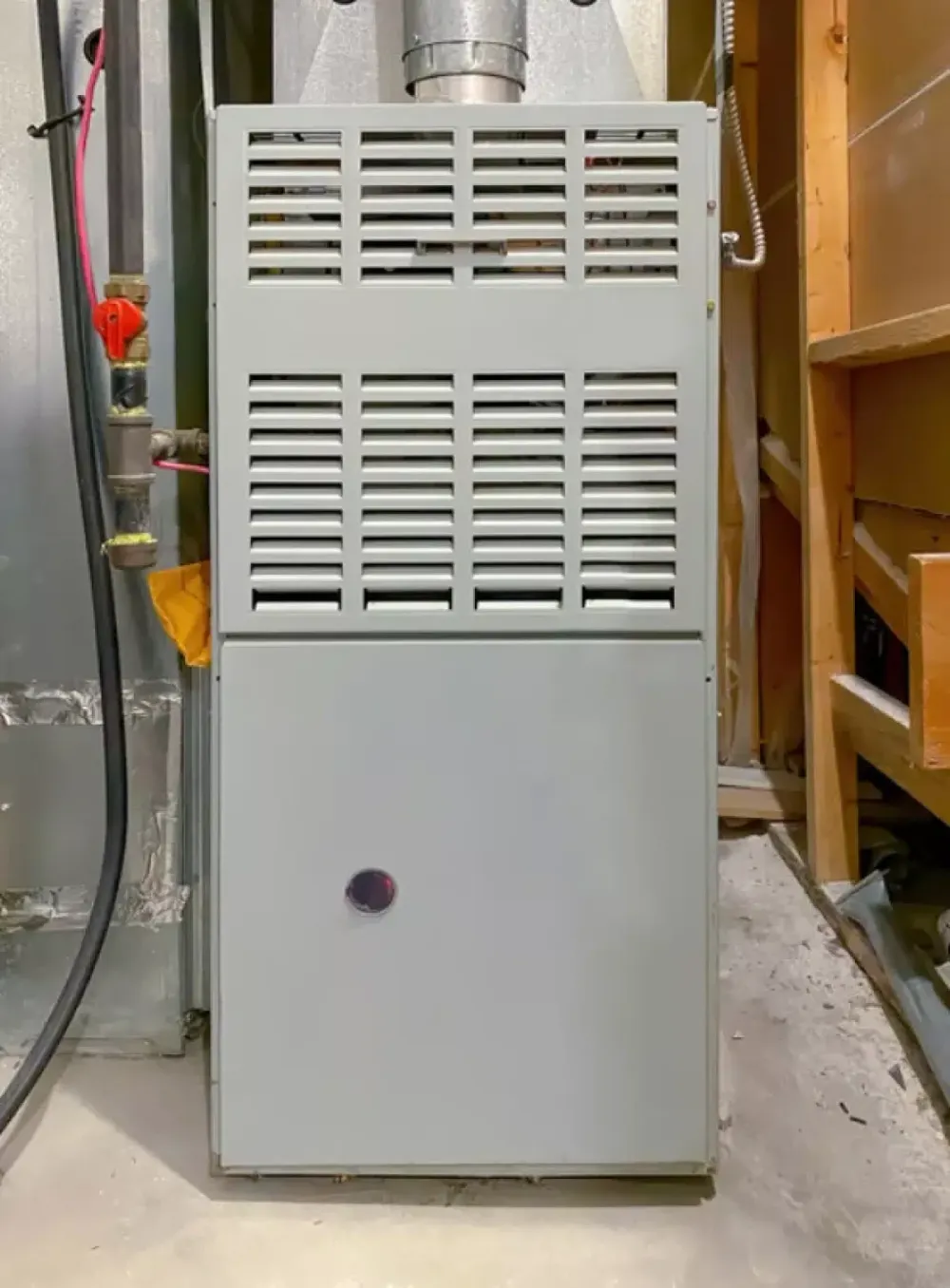 Gas furnace installed in a utility space