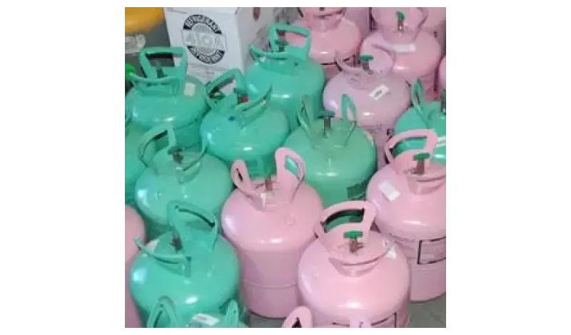 Green and pink refrigerant cylinders