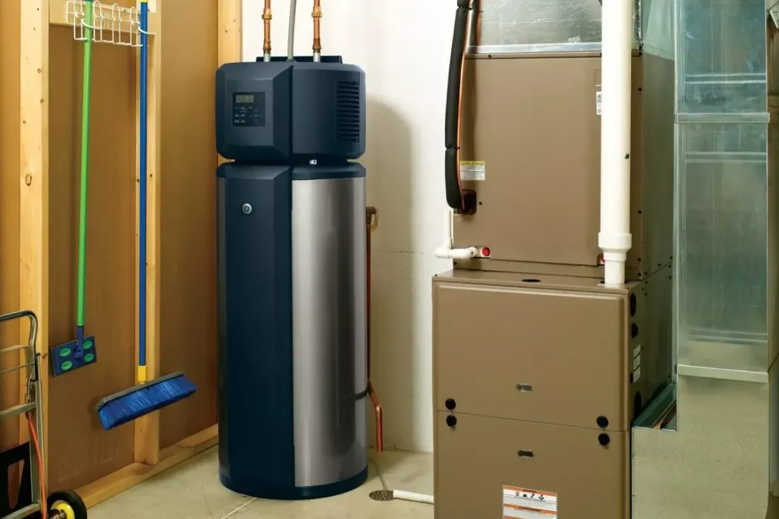 Heat pump water heater beside a furnace