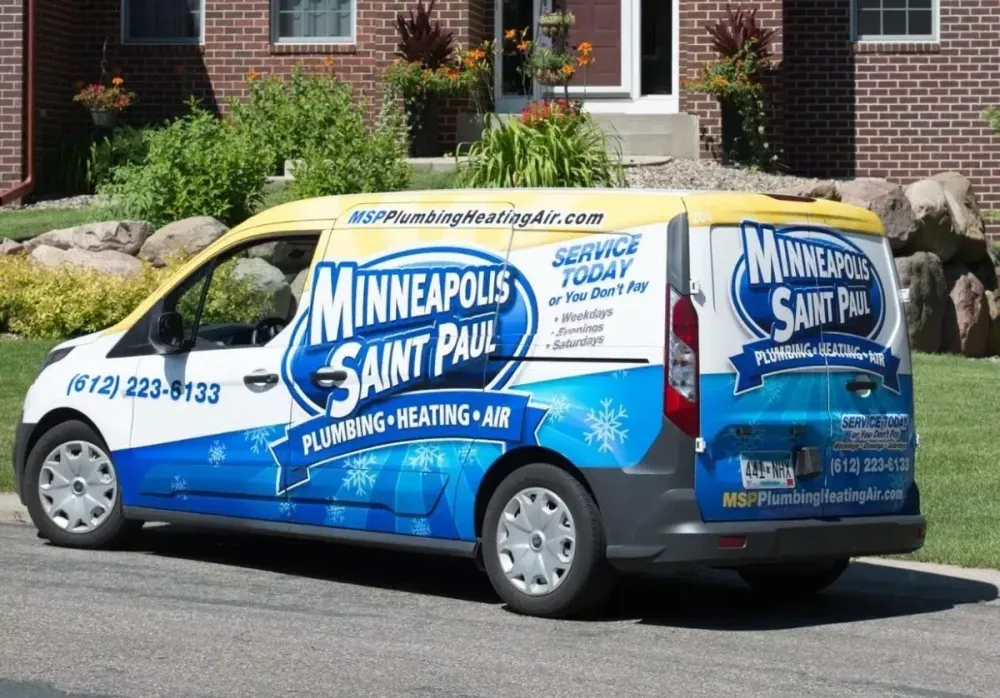 MSP service van parked outside a house