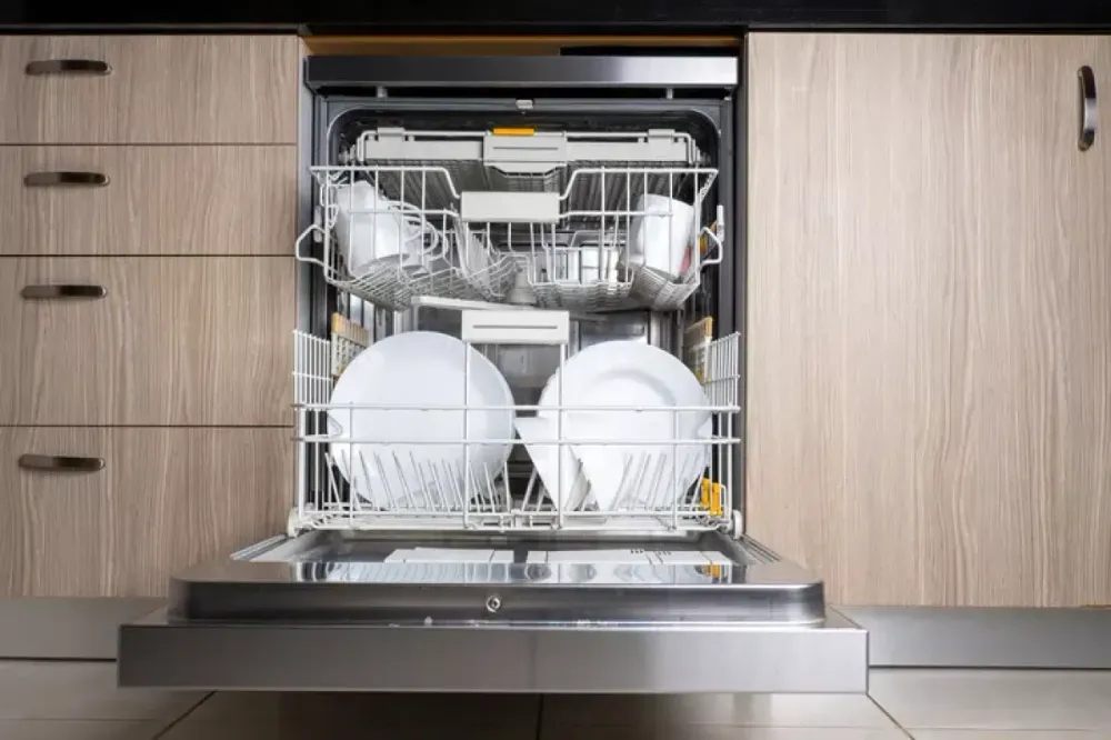 Open dishwasher with clean dishes