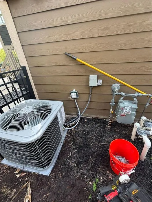 Outdoor condenser during a furnace and air conditioner replacement project