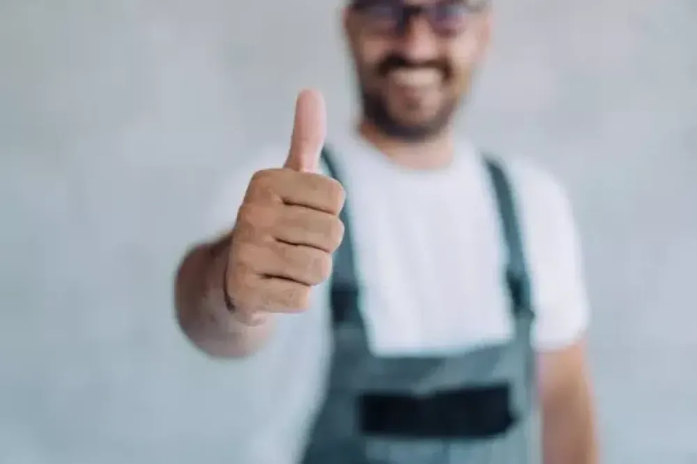 Plumber giving a thumbs-up