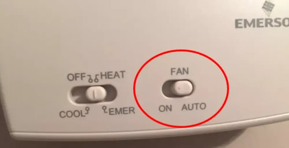 Thermostat fan switch with On and Auto settings circled