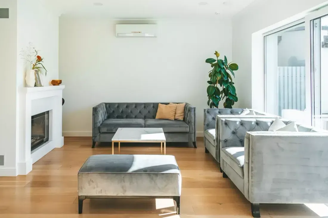 Wall-mounted ductless air conditioner in a living room