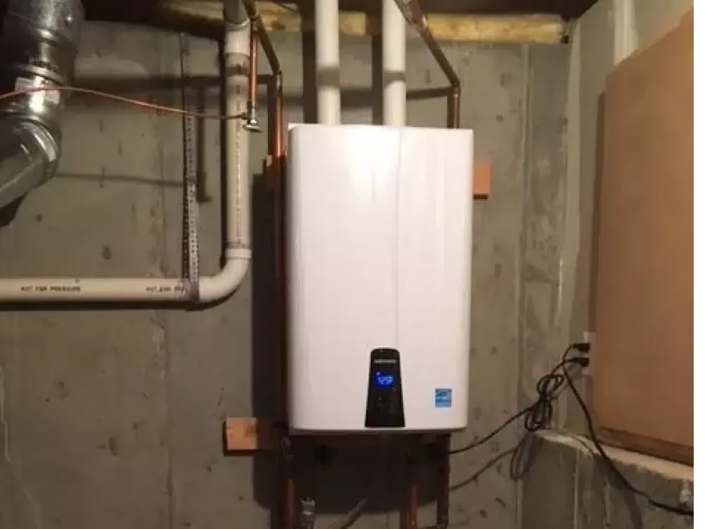 Wall-mounted tankless water heater with connected pipes