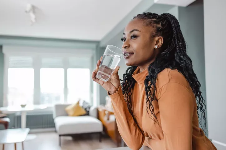 Woman drinking a glass of water