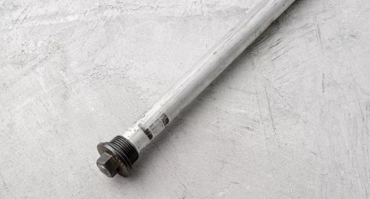 An image of anode rod lying on floor